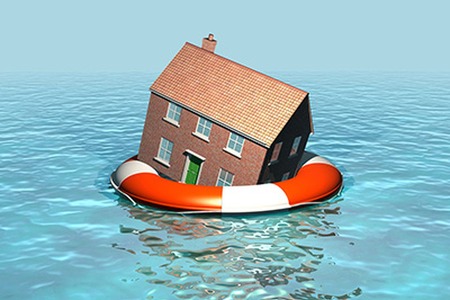 artificial house sitting on a rescue floaty in the middle of water
